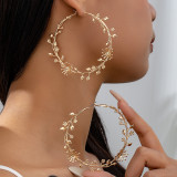 Large flower branch and leaf earrings