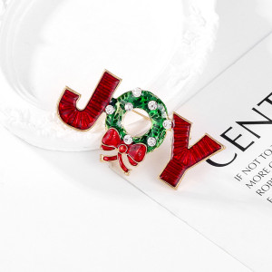 Christmas diamond studded oil drop bow JOY brooch