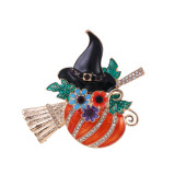 Halloween pumpkin witch with broom, dripping oil, rhinestone brooch
