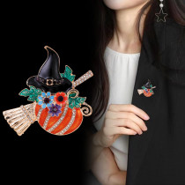 Halloween pumpkin witch with broom, dripping oil, rhinestone brooch