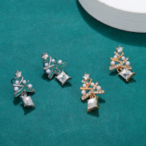 Diamond studded Christmas tree earrings and colorful diamond earrings