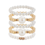 Exaggerated pearl studded diamond layered bracelet set