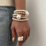 Exaggerated pearl studded diamond layered bracelet set