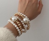 Exaggerated pearl studded diamond layered bracelet set