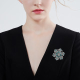 Rotatable Christmas snowflake brooch