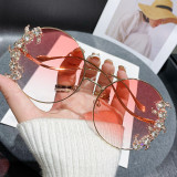 Frameless cut edge inlaid diamond sunglasses, fashionable round rhinestone sunglasses with wave design