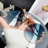 Frameless cut edge inlaid diamond sunglasses, fashionable round rhinestone sunglasses with wave design