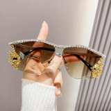 Metal studded diamond sunglasses