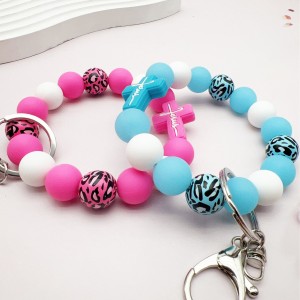 Cross silicone leopard print wooden bead bead bracelet, keychain, bag pendant