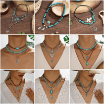 Retro imitation turquoise collarbone chain bead necklace set with heart-shaped cow head