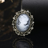 Rhinestone beauty head brooch electroplated alloy retro chest flower women's clothing accessory pin