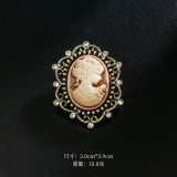 Rhinestone beauty head brooch electroplated alloy retro chest flower women's clothing accessory pin