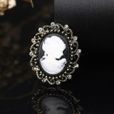 Rhinestone beauty head brooch electroplated alloy retro chest flower women's clothing accessory pin