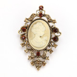 Rhinestone beauty head brooch electroplated alloy retro chest flower women's clothing accessory pin