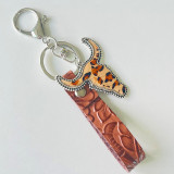Genuine leather keychain, retro ethnic style, brown leather cow head, multi-color western style bag pendant