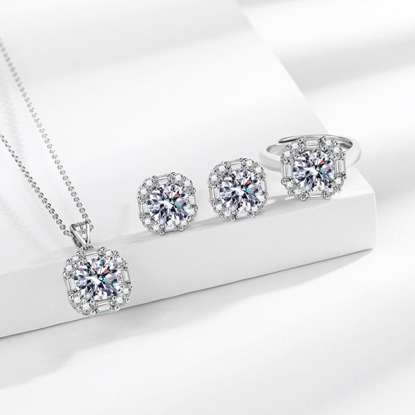 Two carat sugar imitation moissani diamond earrings, necklace, ring, and jewelry set