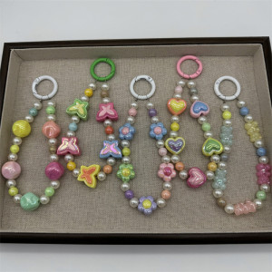 Macaron colored beaded mobile phone chain, cute love flower butterfly pendant, girl's heart pearl bag ornament