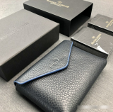Roger Dubuis leather handbag and commemorative poker