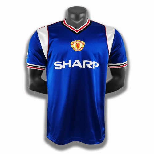 1985 Manchester United away blue jersey