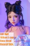 Shedoll 168cm E-cup silicone doll Rose wearing a white dress with a purple ribbon bow