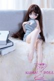 Petite anime doll with brown twin tails wearing revealing gray sweater