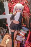 Close-up of soft vinyl elf face with long silver hair and glowing purple eyes