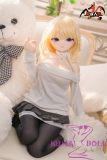 Compact anime doll with large chest, Ami face, and blue eyes in playful pose