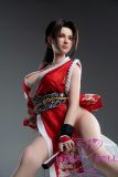 Side profile of 165cm G-cup silicone doll in red ninja outfit