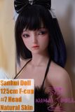 Sanhui 125cm F-cup silicone sex doll with head #7 wearing black lingerie, reclining on a sofa