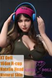 XTDOLL 166cm H-cup Natalie full silicone sex doll in sporty outfit on couch