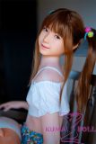 Side view of J-cute 149cm silicone sex doll with new body makeup and white two-piece clothing