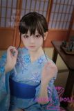 Close-up of Moa silicone head on MLW 138cm Loli doll in blue kimono