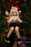 Anime doll by Christmas tree