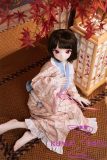 Anime doll sitting pose view