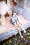anime doll sitting pose on bed