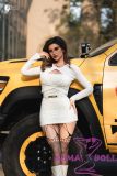 white dress doll standing outdoor scene