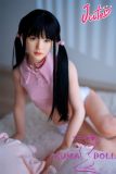 Cute adult doll realistic face close-up