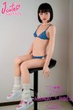 petite doll sitting bikini style