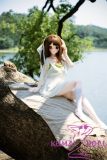 White dress anime doll seated pose