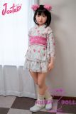 Petite silicone doll standing