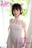 White dress silicone doll standing