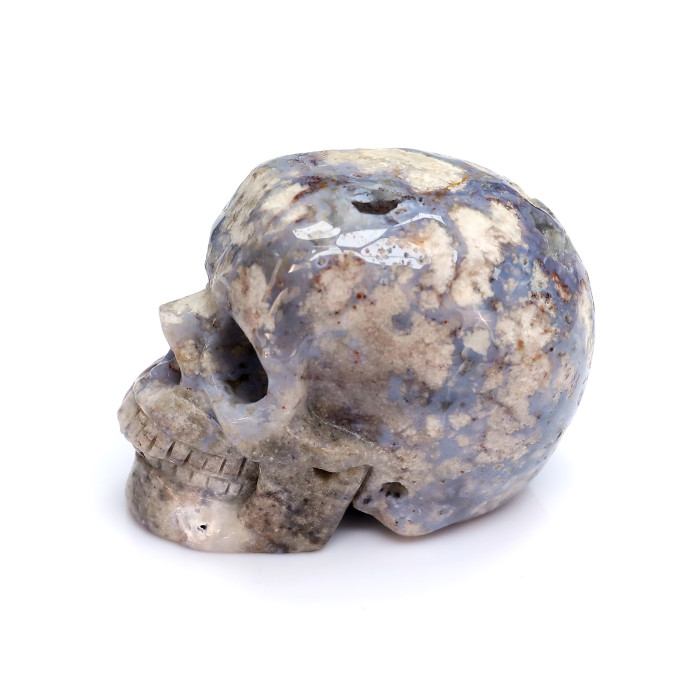 A small blue agate skull carving natural human skull crystal feng shui model gift