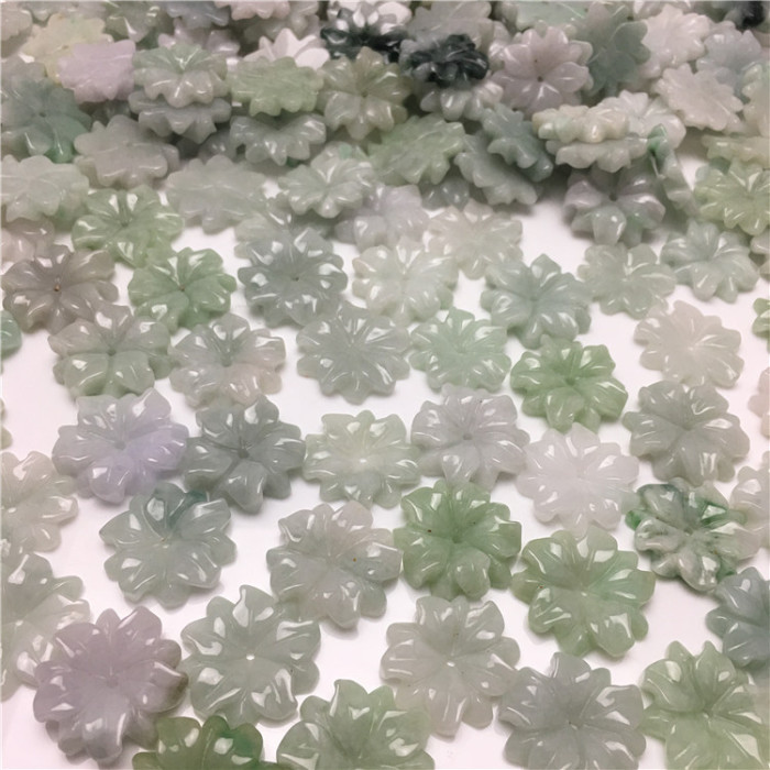 Wholesale natural true green sunflower jade pendants from Myanmar for the production of religious jewelry