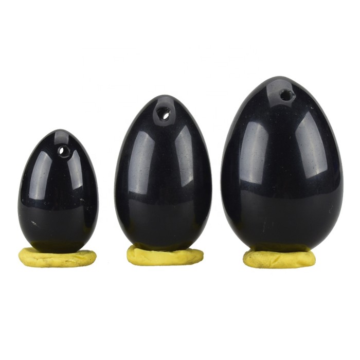 A set of three-carved obsidian Uni egg semi-precious stone handicrafts