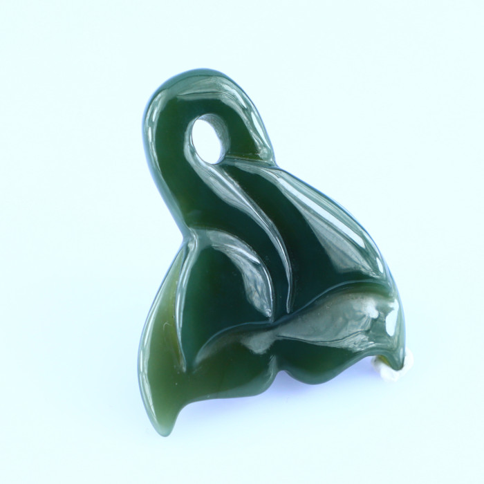 Arthur's Canadian nephrite fishhook carved jade pendant is natural