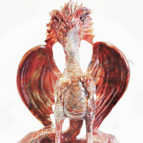 High-quality natural red jade, realistic crystal animal statues, and large dragon skull carvings