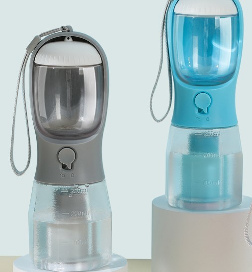 Carry a 3-in-1 water bottle multi-functional pet product with you during the grey dog walk training