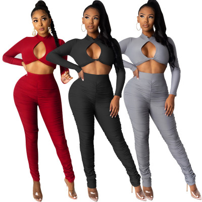 Sexy Solid Color Round Neck Long Sleeves Hollow Out Cropped Top With Pleated Trousers Two Piece Sets