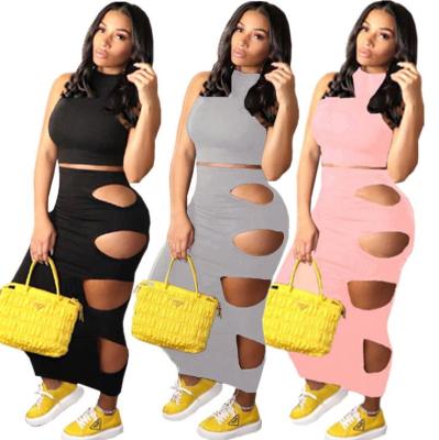 Womens sexy solid color ripped hole sleeveless two-piece skirt suit QY5052