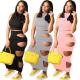 Womens sexy solid color ripped hole sleeveless two-piece skirt suit QY5052
